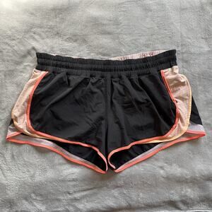 Lululemon Size 12 Super Squad Lined Running Shorts Black and Peach 2.5” Inseam